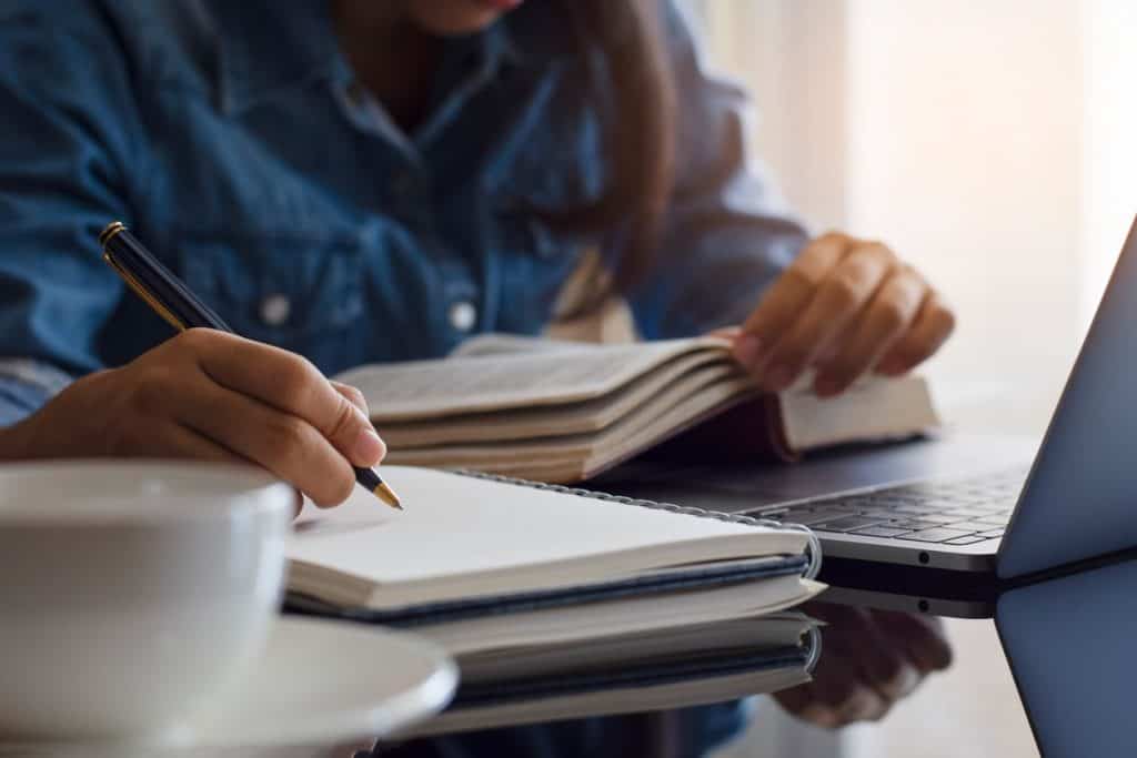 female student writing